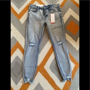 Q2 distressed skinny button fly jeans